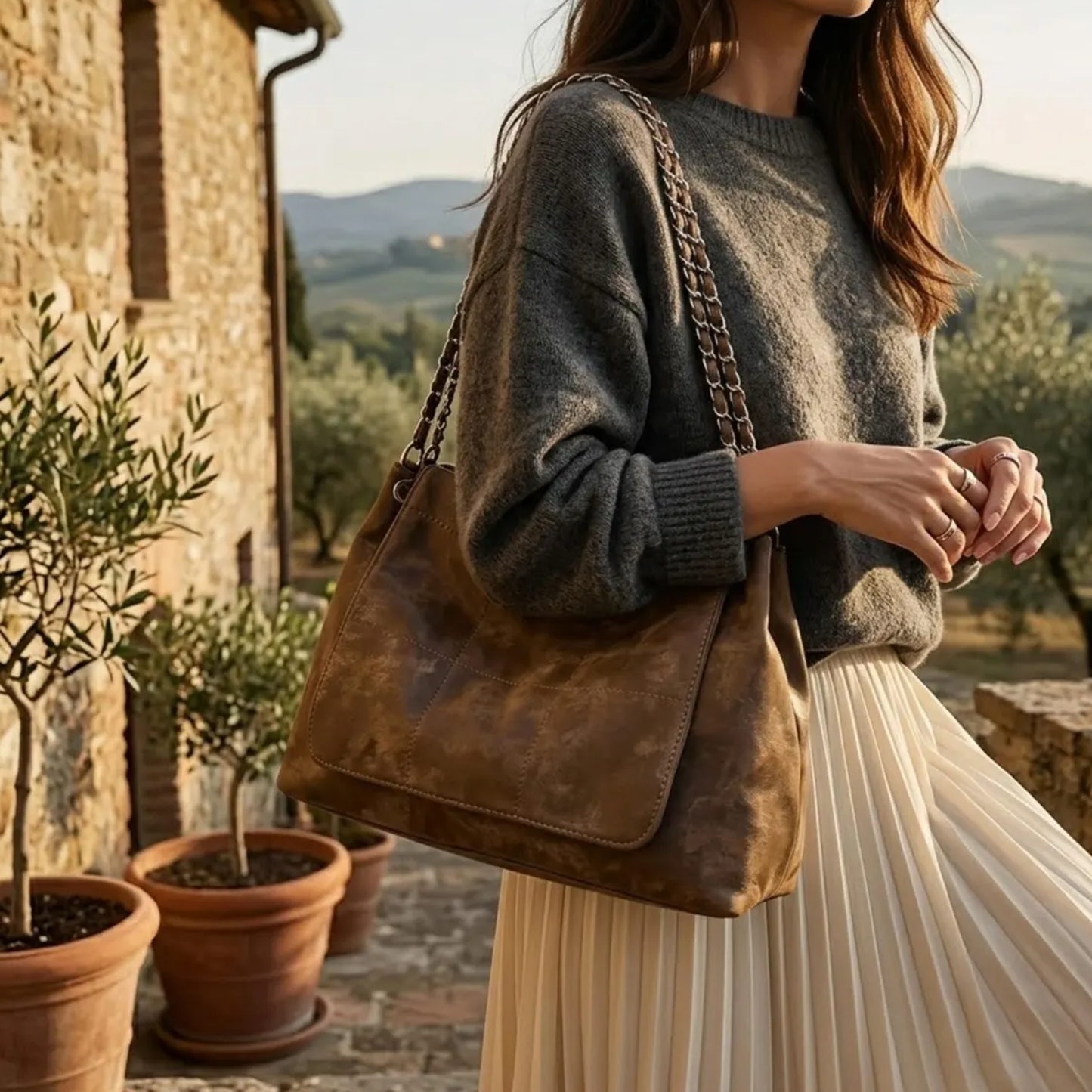 Faded Cocoa Brown Grid Stitch Slouch Shoulder Bag With Dual Interwoven Metal Chain Straps, Layered Front Flap Pocket And Spacious Draped Main Compartment