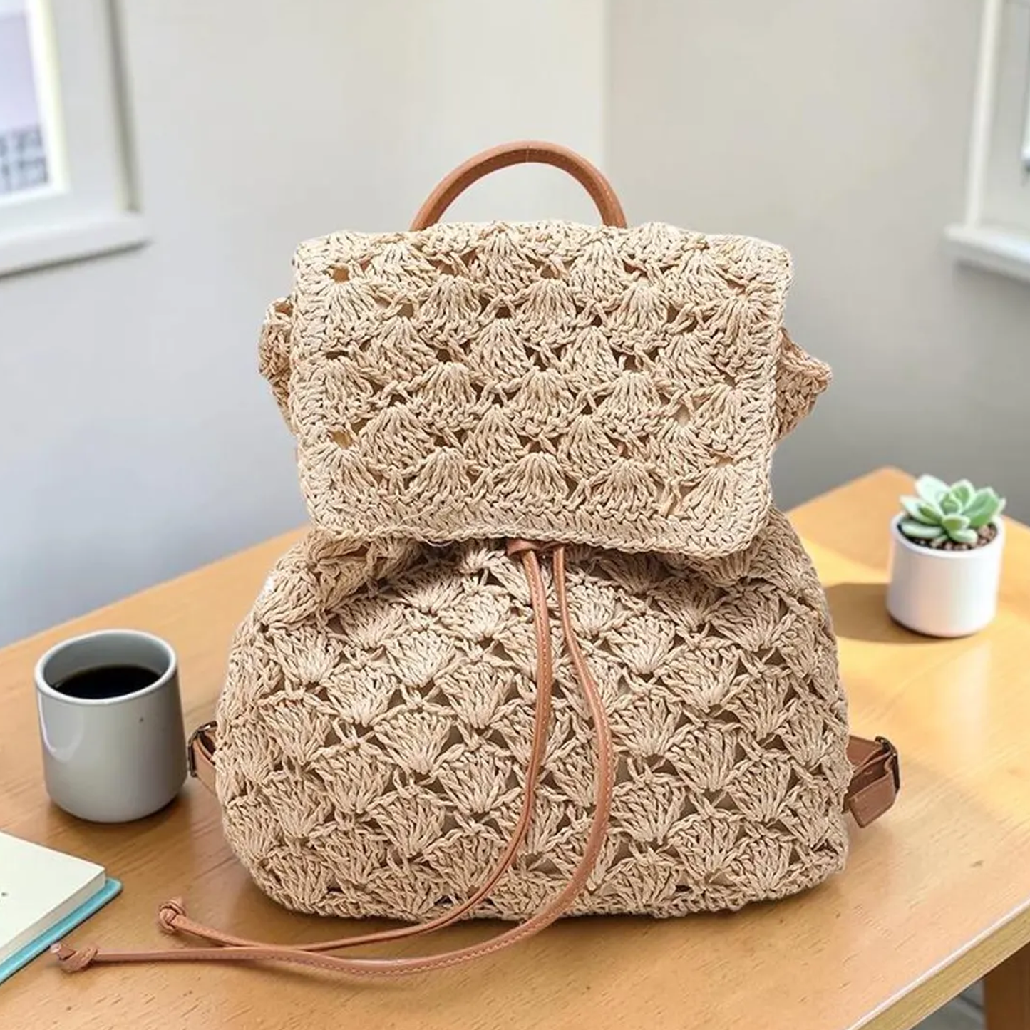 Warm Beige Fan Knit Woven Drawstring Rucksack With Tan Trimmed Top Handle, Overlay Front Flap And Slim Leather Shoulder Straps