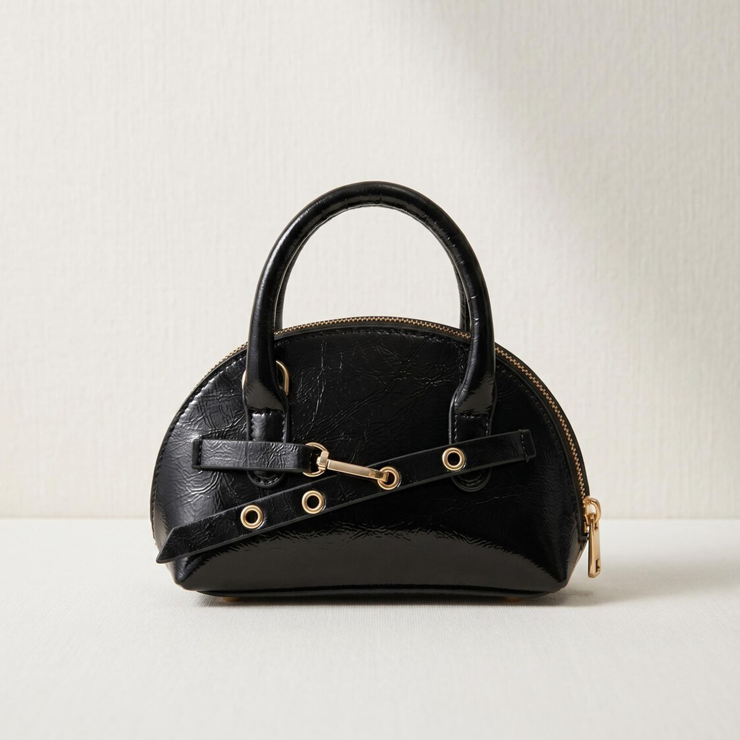 Solid Black Gloss Crinkled Arched Dome Mini Handbag With Short Curved Top Grips, Gold Tone Eyelet Decorative Strap And Base Protective Round Feet