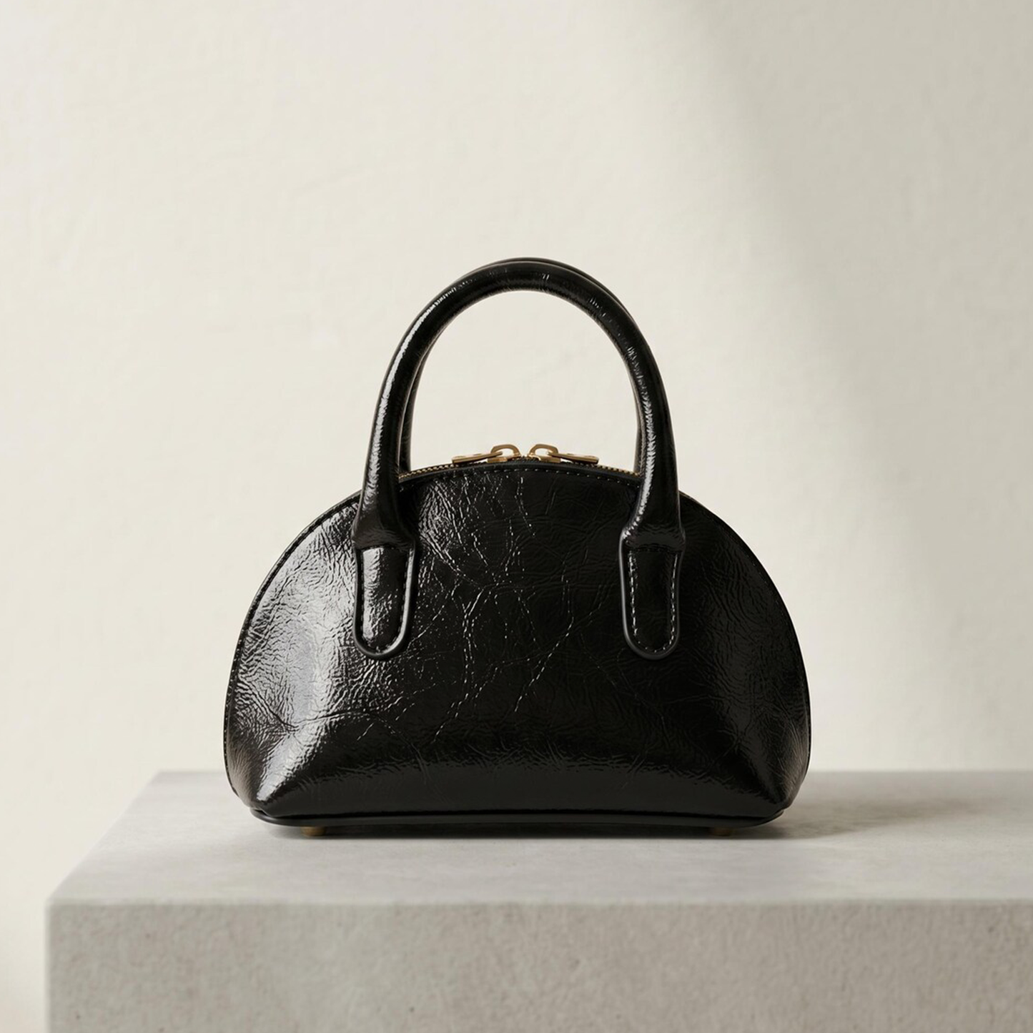 Solid Black Gloss Crinkled Arched Dome Mini Handbag With Short Curved Top Grips, Gold Tone Eyelet Decorative Strap And Base Protective Round Feet