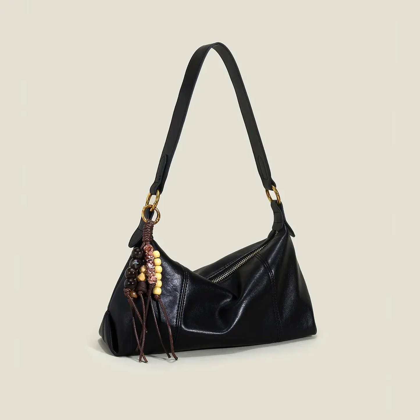 Solid Black Elongated Wrinkled Hobo Handbag With Gold Interlock Ring Hardware, Multi-Tone Bead Tassel Charm And Full Horizontal Zipper Closure
