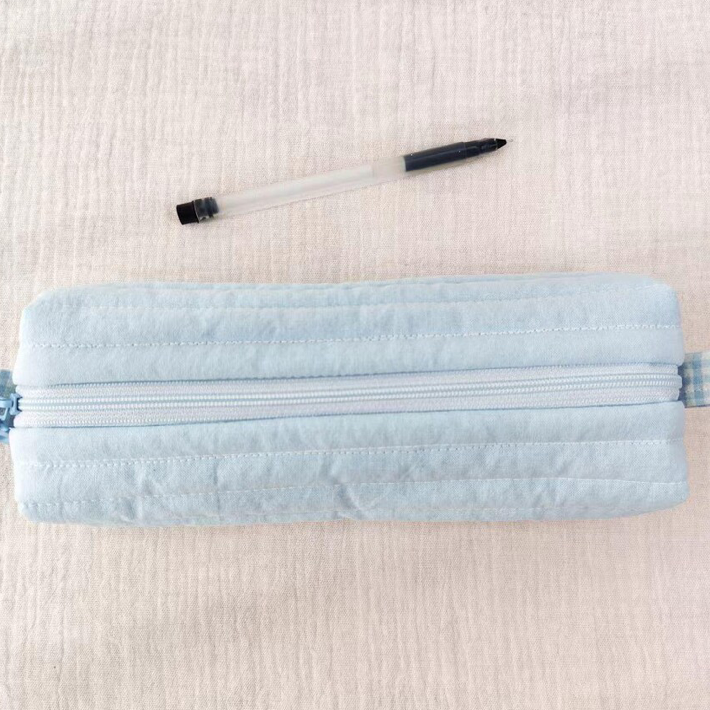Horizontal Quilted Rectangular Stationery Pouch With Floral Shaped Zipper Pulls, Checkered Fabric End Tabs And Slim Elongated Inner Storage Cavity
