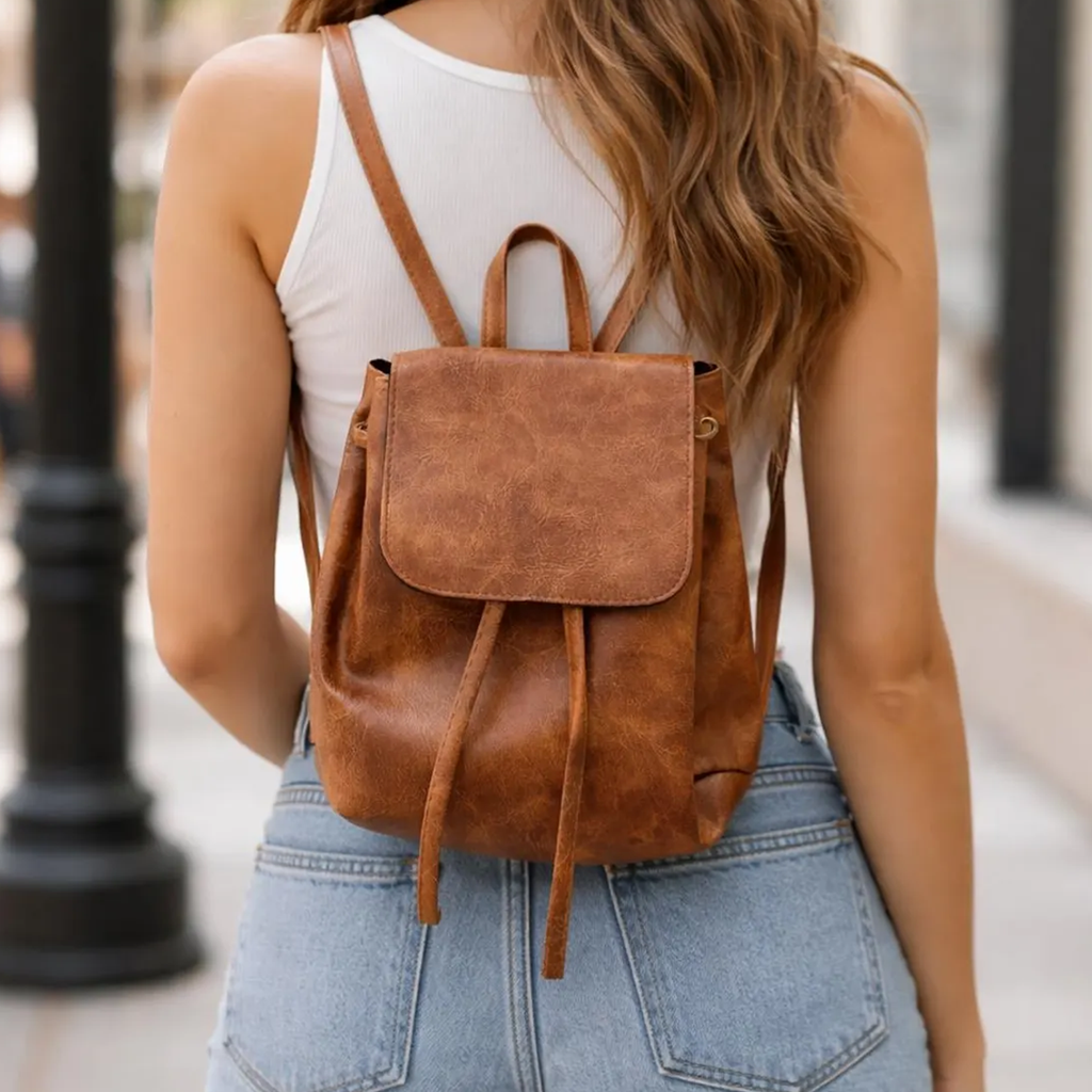 Weathered Warm Brown Vintage Mini Drawstring Backpack With Overlay Front Flap, Side Slip Storage Pockets And Short Top Carry Loop Grip