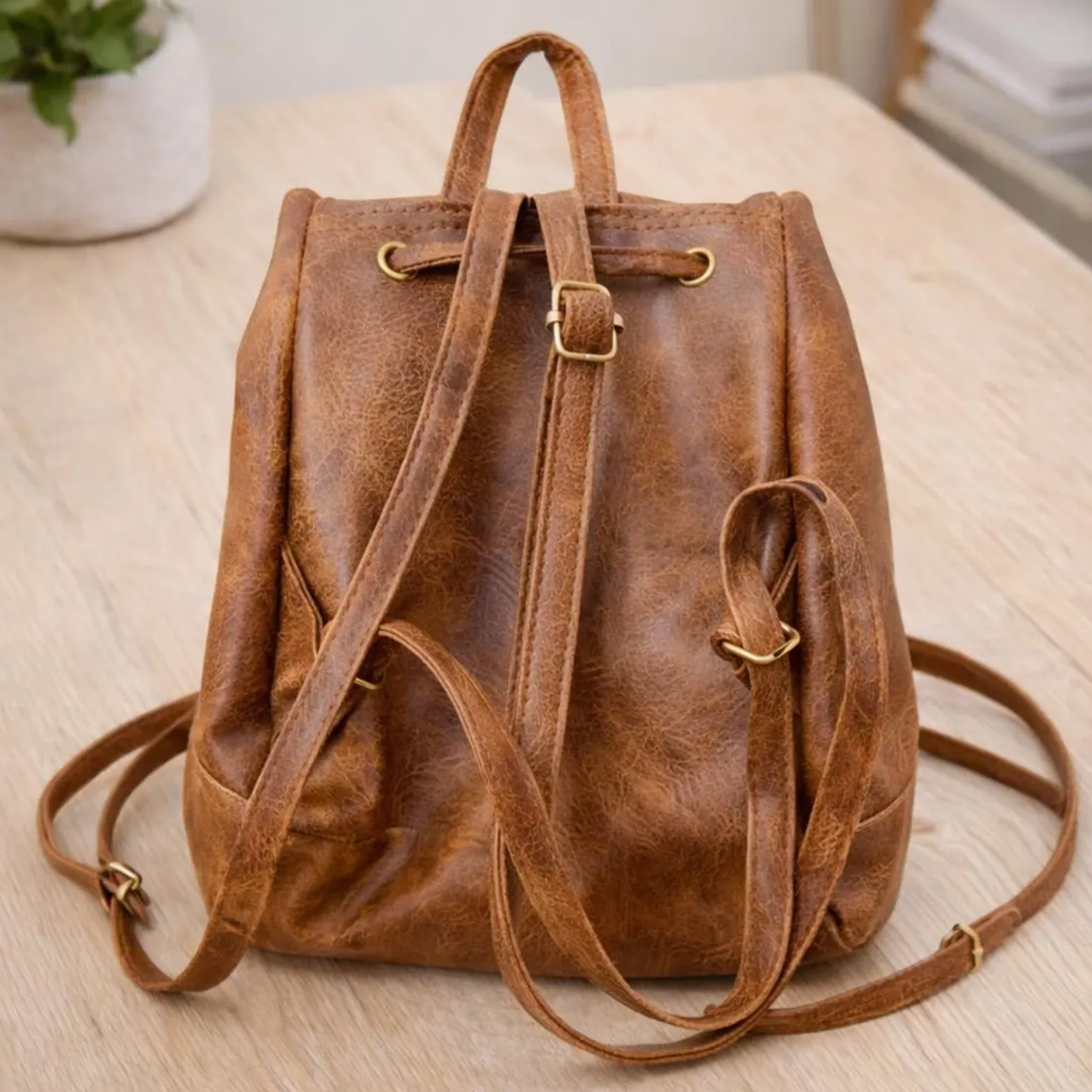 Weathered Warm Brown Vintage Mini Drawstring Backpack With Overlay Front Flap, Side Slip Storage Pockets And Short Top Carry Loop Grip
